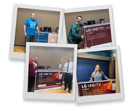 Customers receiving their free tvs